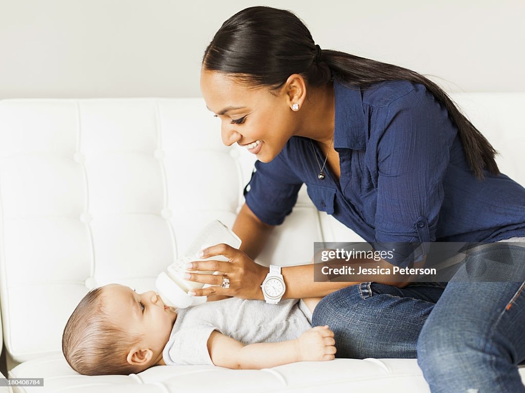 USA, Utah, Lehi, Mother feeding baby (2-5 moths)