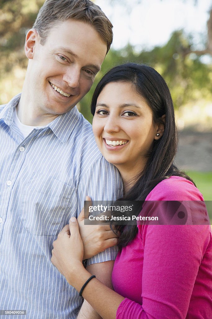 USA, California, Irvine, Couple embracing in park