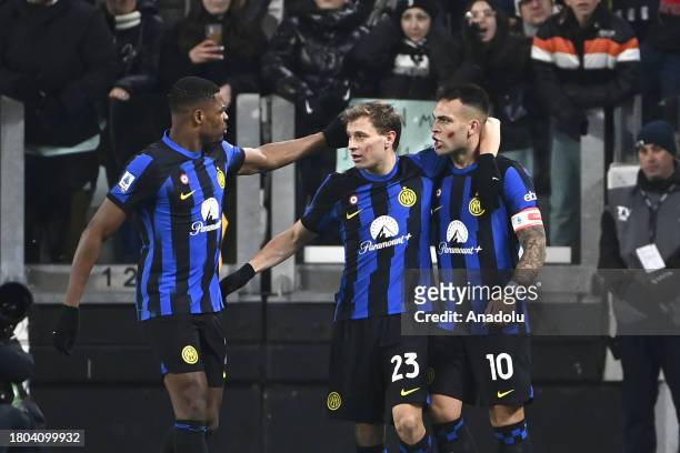 Lautaro Martinez of FC Internazionale celebrates with his teammates Denzel Dumfries and Nicolo Barella after scoring during the Italian Serie A...