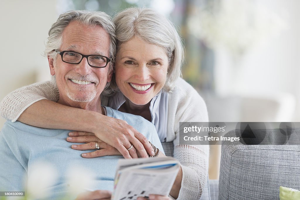 USA, New Jersey, Jersey City, Senior woman embracing senior man