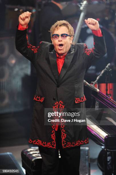 Elton John performs at day 12 of the iTunes Festival 2013 at The Camden Roundhouse on September 12, 2013 in London, England.