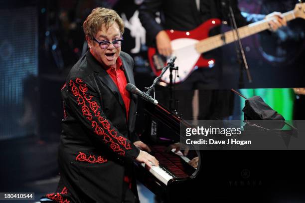 Elton John performs at day 12 of the iTunes Festival 2013 at The Camden Roundhouse on September 12, 2013 in London, England.