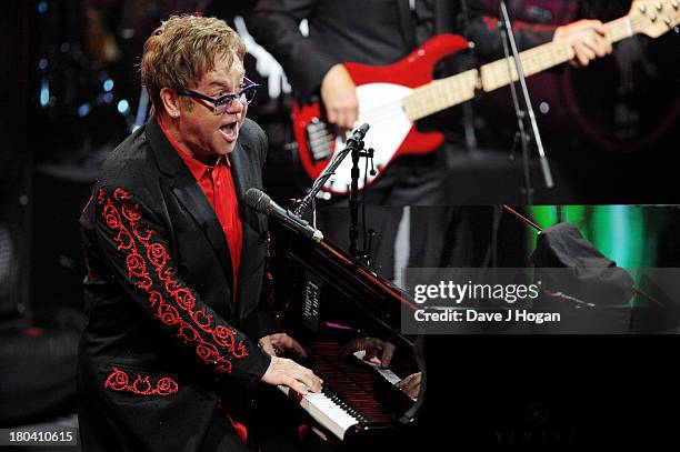 Elton John performs at day 12 of the iTunes Festival 2013 at The Camden Roundhouse on September 12, 2013 in London, England.