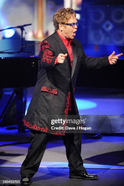 Elton John performs at day 12 of the iTunes Festival 2013 at The Camden Roundhouse on September 12, 2013 in London, England.