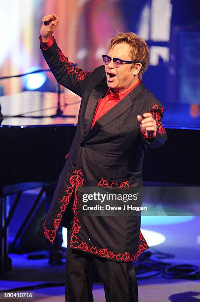 Elton John performs at day 12 of the iTunes Festival 2013 at The Camden Roundhouse on September 12, 2013 in London, England.