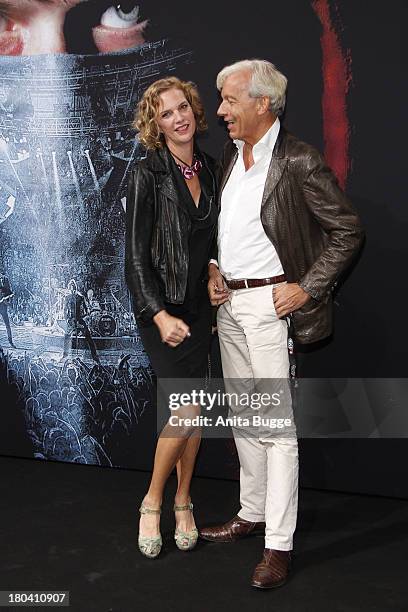 Alexandra Rohleder and Jo Groebel attend the 'Metallica - Through The Never' German premiere at Cinestar Sonycenter on September 12, 2013 in Berlin,...