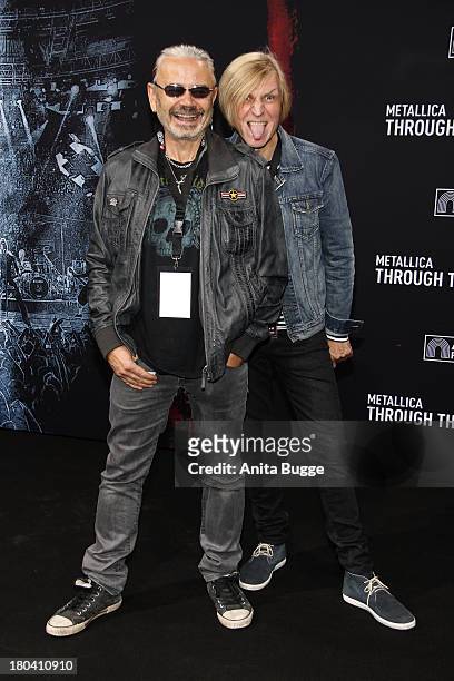 Jaecki Reznizeck and Richie Barton attend the 'Metallica - Through The Never' German premiere at Cinestar Sonycenter on September 12, 2013 in Berlin,...