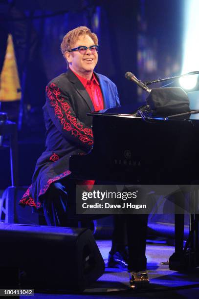 Elton John performs at day 12 of the iTunes Festival 2013 at The Camden Roundhouse on September 12, 2013 in London, England.