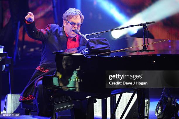 Elton John performs at day 12 of the iTunes Festival 2013 at The Camden Roundhouse on September 12, 2013 in London, England.