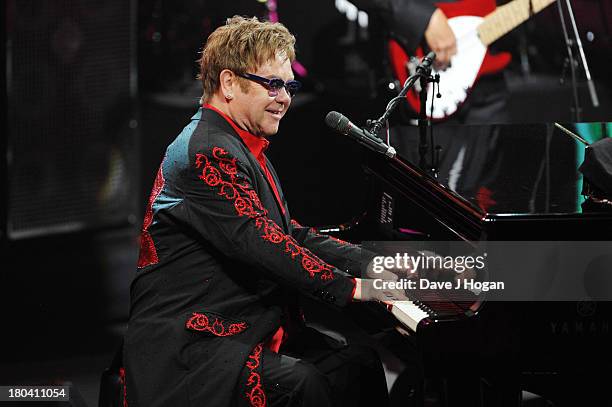 Elton John performs at day 12 of the iTunes Festival 2013 at The Camden Roundhouse on September 12, 2013 in London, England.