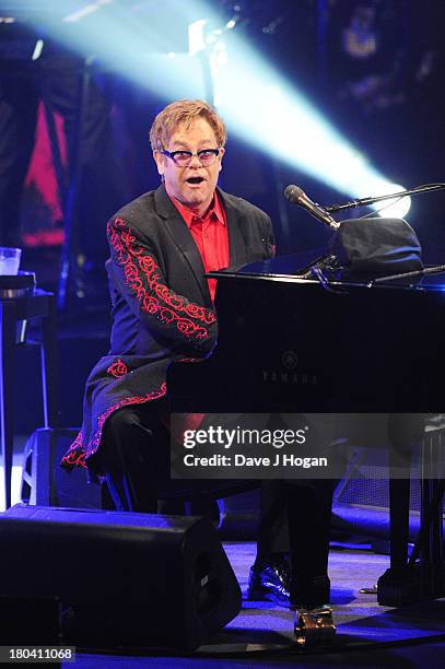 Elton John performs at day 12 of the iTunes Festival 2013 at The Camden Roundhouse on September 12, 2013 in London, England.