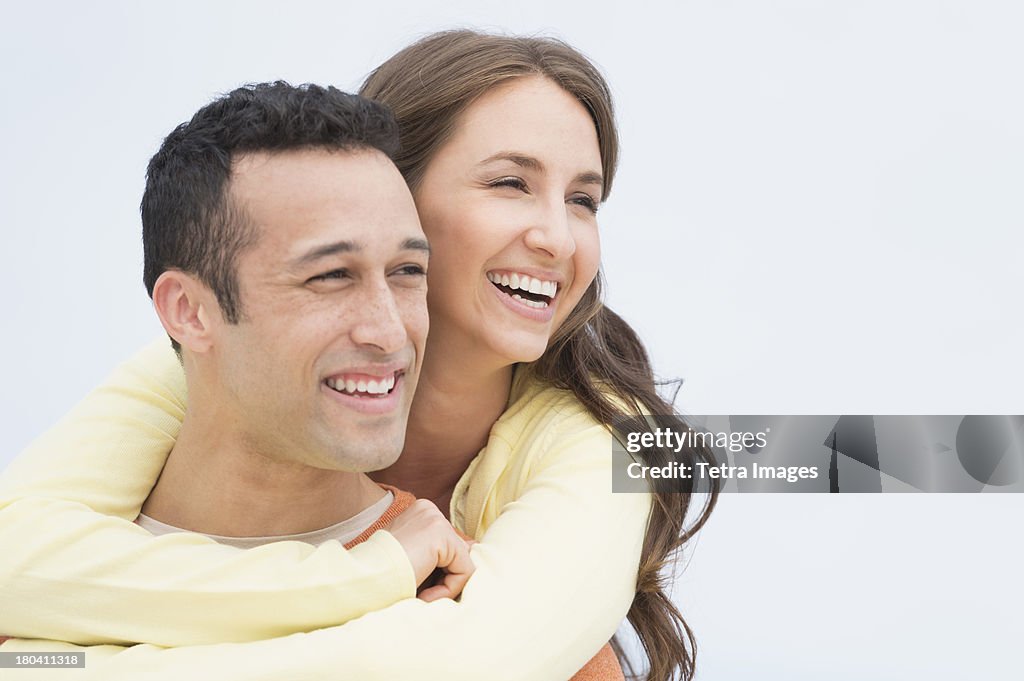 USA, New Jersey, Jersey City, Happy young couple embracing