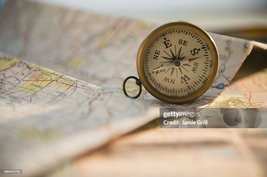 Studio Shot of maps and compass