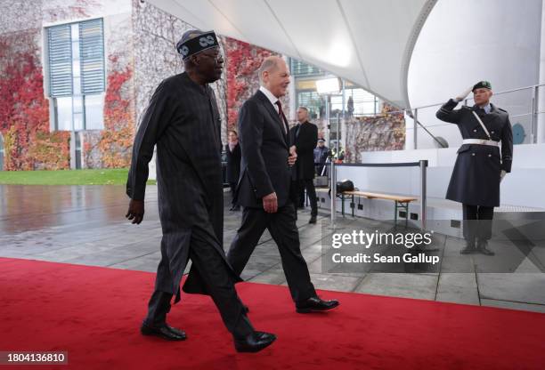 German Chancellor Olaf Scholz welcomes Bola Ahmed Adekunle Tinubu, President of Nigeria, at the Chancellery during the G20 Compact With Africa...