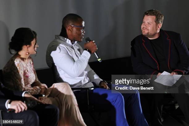 Director Waad Al-Kateab and Cyrille Tchatchet II speak with moderator James Corden during a Q&A following the Premiere screening of "We Dare to...