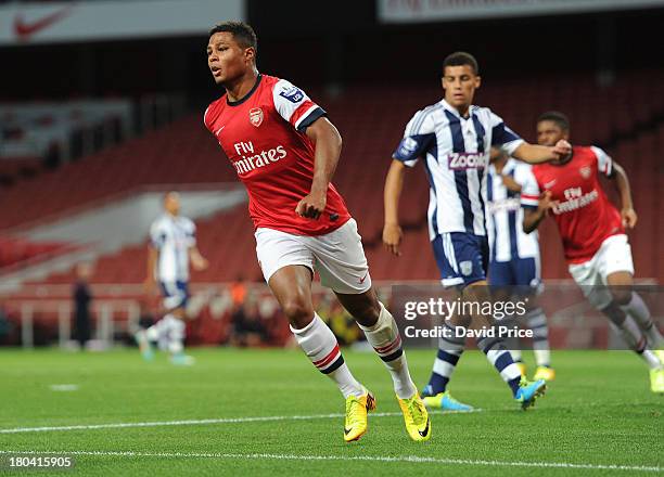 Serge Gnabry celebrates after scoring a goal for Arsenal during the U21 Premier League match between Arsenal U21 and West Bromwich Albion U21 at...