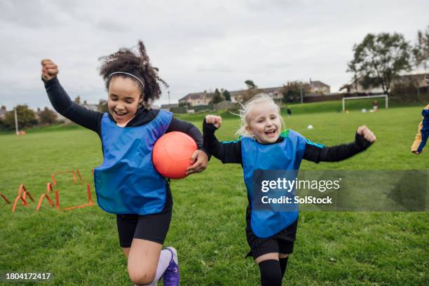 girls football celebrations - girls stock pictures, royalty-free photos & images