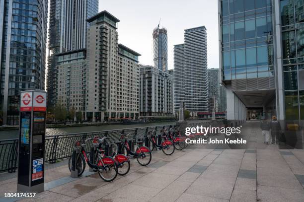 General view of Santander hire bicycles docked at South Quay East in Canary Wharf on November 4, 2023 in London, United Kingdom.