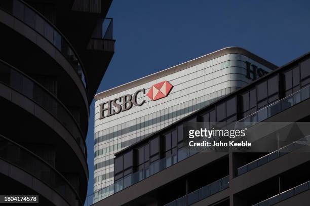 General view of the HSBC Bank building between residential apartments in Canary Wharf on November 4, 2023 in London, United Kingdom.
