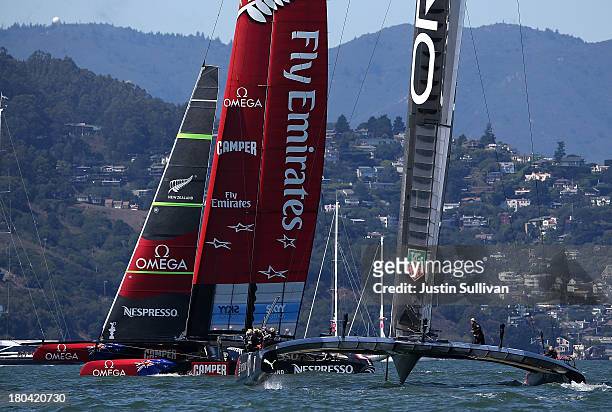 Emirates Team New Zealand skippered by Dean Barker and Oracle Team USA skippered by James Spithill in action during race six of the America's Cup...