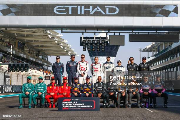 Drivers pose for a group photo ahead of Formula 1 Abu Dhabi Grand Prix at Yas Marina Circuit on November 26, 2023 in Abu Dhabi, United Arab Emirates.