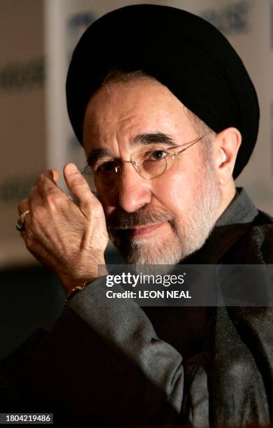 Former Iranian president Mohammad Khatami gives a press conference at Chatham House in London 01 November 2006. Khatami faced noisy protests from...