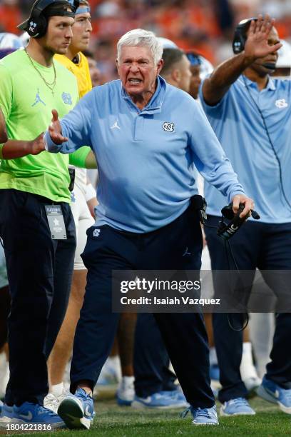 Head coach Mack Brown of the North Carolina Tar Heels reacts after a play against the Clemson Tigers at Memorial Stadium on November 18, 2023 in...