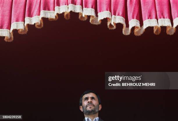 Iranian hardline President Mahmoud Ahmadinejad attends a public meeting in the town of Shahriar, some 50 kms southwest of Tehran, 11 October 2006....