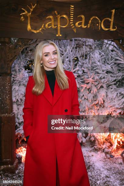 Katherine Jenkins wears a red coat as she visits LaplandUK, a popular family Christmas experience, at Whitmoor Forest on November 20, 2023 in...