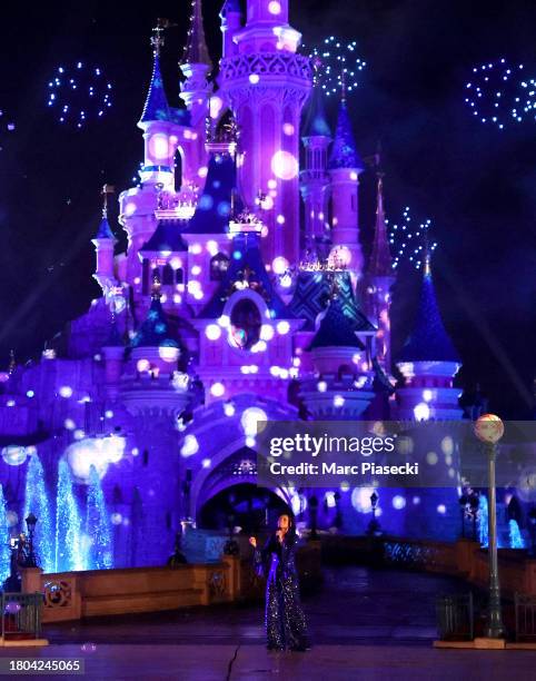 Wish's Ariana DeBose performs in front of Sleeping Beauty's Castle at Disneyland Paris on November 17, 2023 in Paris, France.