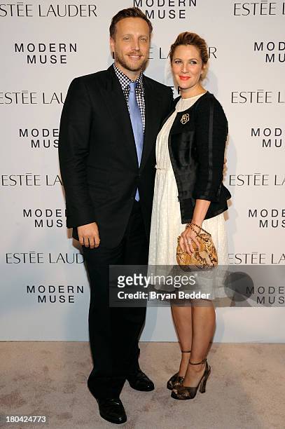 Actress Drew Barrymore and InStyle Managing Editor Ariel Foxman attend the Estee Lauder "Modern Muse" Fragrance Launch Party at the Guggenheim Museum...