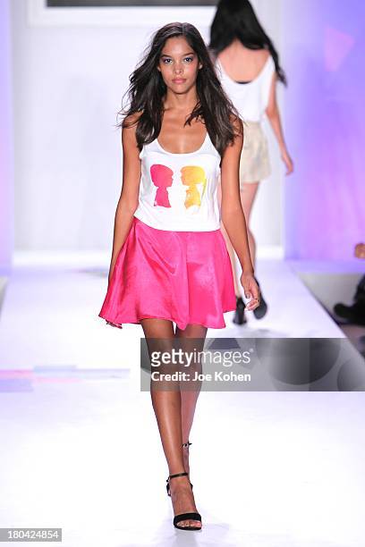 Model walks the runway at the Just Dance with Boy Meets girl by Stacy Igel fashion show during Style360 Spring 2014 at Metropolitan Pavilion on...