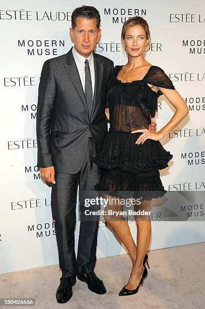 Magazine Editor Stefano Tonchi and model Carolyn Murphy attend the Estee Lauder "Modern Muse" Fragrance Launch Party at the Guggenheim Museum on...