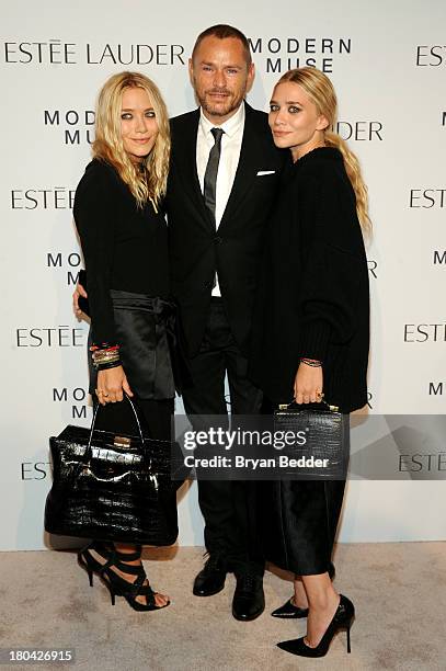 Mary-Kate Olsen, makeup artist Tom Pecheux and Ashley Olsenattends the Estee Lauder "Modern Muse" Fragrance Launch Party at the Guggenheim Museum on...