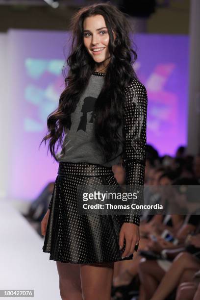 Model walks the runway during Just Dance with Boy Meets Girl show at the STYLE360 Fashion Pavilion in Chelsea on September 12, 2013 in New York City.