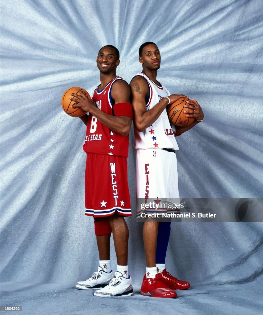 Bryant and McGrady pose for a portrait