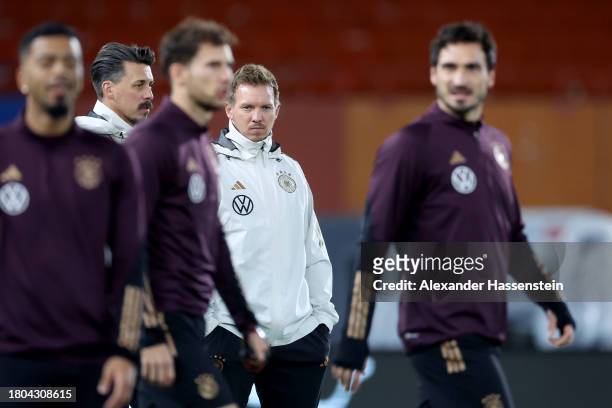 Julian Nagelsmann, head coach of Germany looks on with his assistent coach Sandro Wagner during a DFB Training Session at Ernst Happel Stadion on...