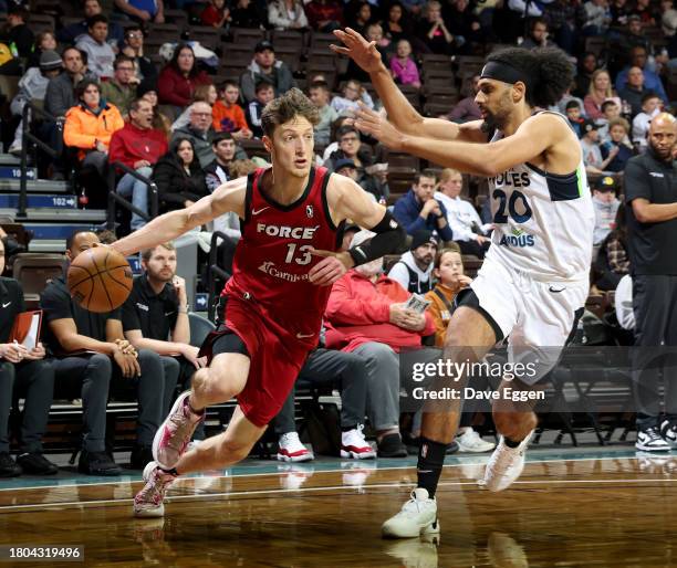 November 26: Drew Peterson of the Sioux Falls Skyforce drives against Brian Bowen II of the Iowa Wolves during their game at the Sanford Pentagon on...