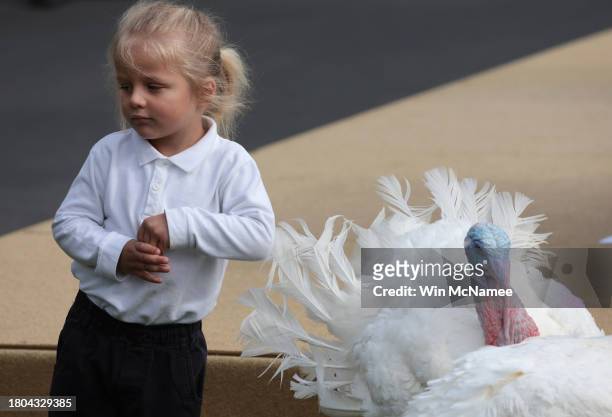 Beau Biden, the grandson of U.S. President Joe Biden, stands with Liberty the National Thanksgiving Turkey, during the pardoning ceremony on the...