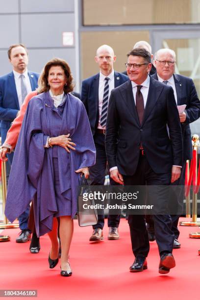 Queen Silvia of Sweden and Prime Minister Boris Rhein attend the opening of the first "Childhood House" on November 20, 2023 in Hessen, Germany.