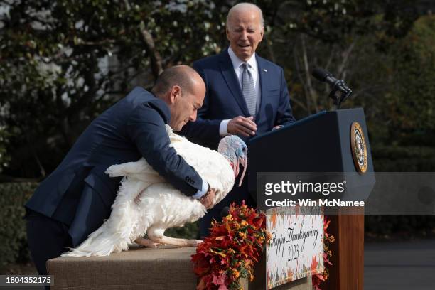 As Jose Rojas, Vice President at Jennie-O, places Liberty on a table, U.S. President Joe Biden pardons the National Thanksgiving turkeys Liberty and...