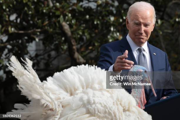 President Joe Biden pardons the National Thanksgiving turkeys Liberty and Bell during a ceremony on the South Lawn of the White House on November 20,...