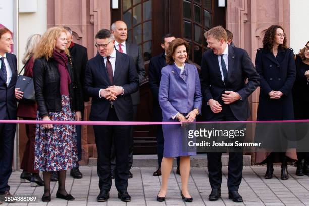 Guest, Prime Minister Boris Rhein, Queen Silvia of Sweden and Jürgen Graf open the first "Childhood House" on November 20, 2023 in Hessen, Germany.