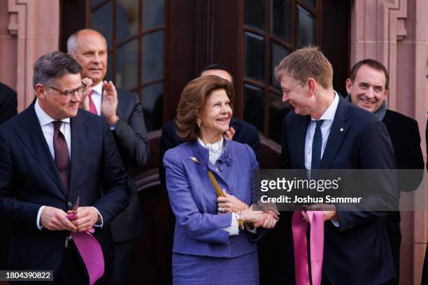 Prime Minister Boris Rhein, Queen Silvia of Sweden and Jürgen Graf open the first "Childhood House" on November 20, 2023 in Hessen, Germany.