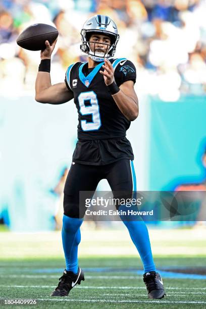 Bryce Young of the Carolina Panthers throws a pass against the Dallas Cowboys in the third quarter at Bank of America Stadium on November 19, 2023 in...