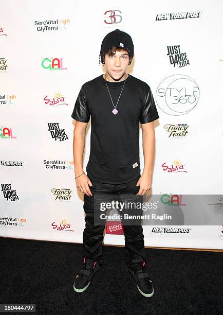 Recording artist Austin Mahone attends Just Dance with Boy Meets Girl at Fashion Pavilion in Chelsea on September 12, 2013 in New York City.