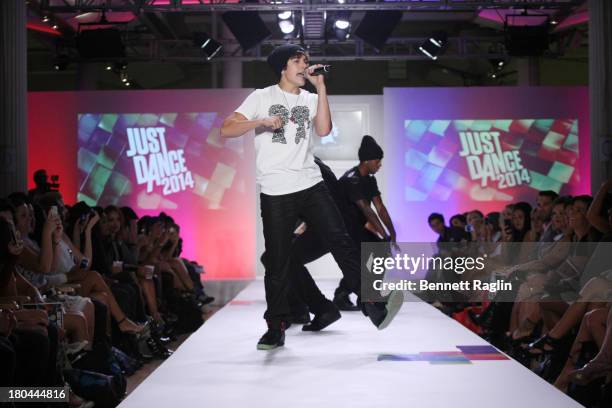 Recording artist Austin Mahone performs during Just Dance with Boy Meets Girl at Fashion Pavilion in Chelsea on September 12, 2013 in New York City.