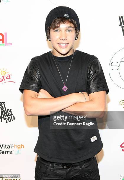 Recording artist Austin Mahone attends Just Dance with Boy Meets Girl at Fashion Pavilion in Chelsea on September 12, 2013 in New York City.