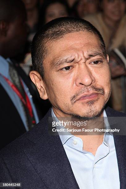 Director and actor Hitoshi Matsumoto arrives at the "R100' Premiere during the 2013 Toronto International Film Festival at Ryerson Theatre on...
