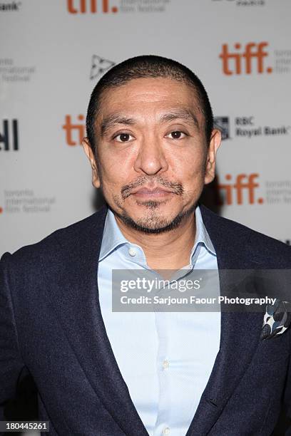 Director and actor Hitoshi Matsumoto arrives at the "R100' Premiere during the 2013 Toronto International Film Festival at Ryerson Theatre on...